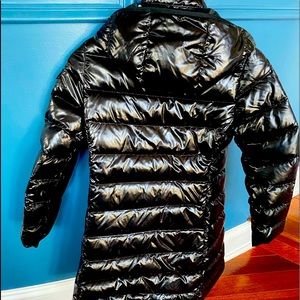 Black kids size 10 Moncler coat removable hood snap closure. Front zip pockets.